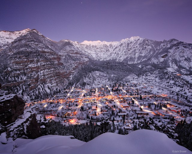 Skies clear at twilight after several days of snow storms in Ouray, Colorado in the San Juan Mountains.